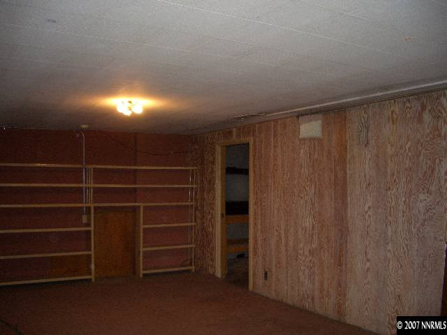 765 Belgrave Avenue Reno, NV 89502 - Photo 8 of 9 a view of walk in closet with empty racks
