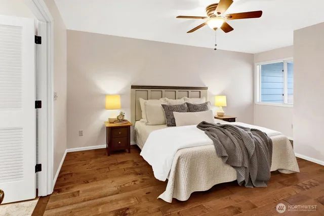 a bed room with a bed and a chandelier