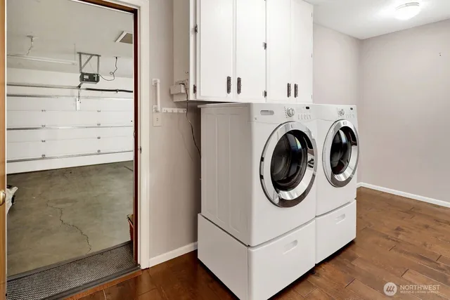 a utility room with dryer and washer