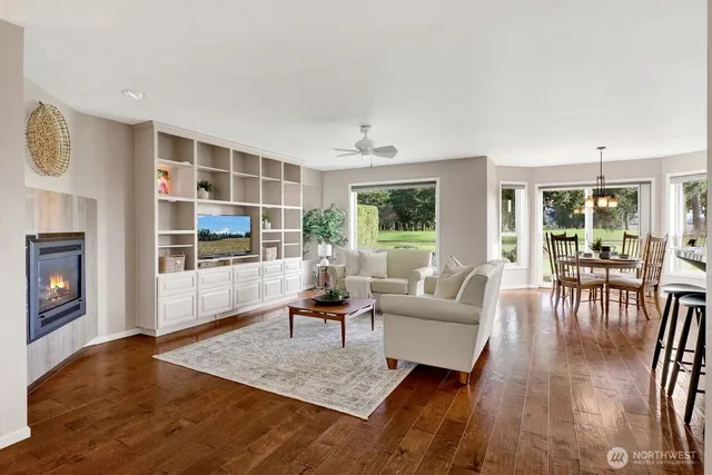 a living room with furniture and a table