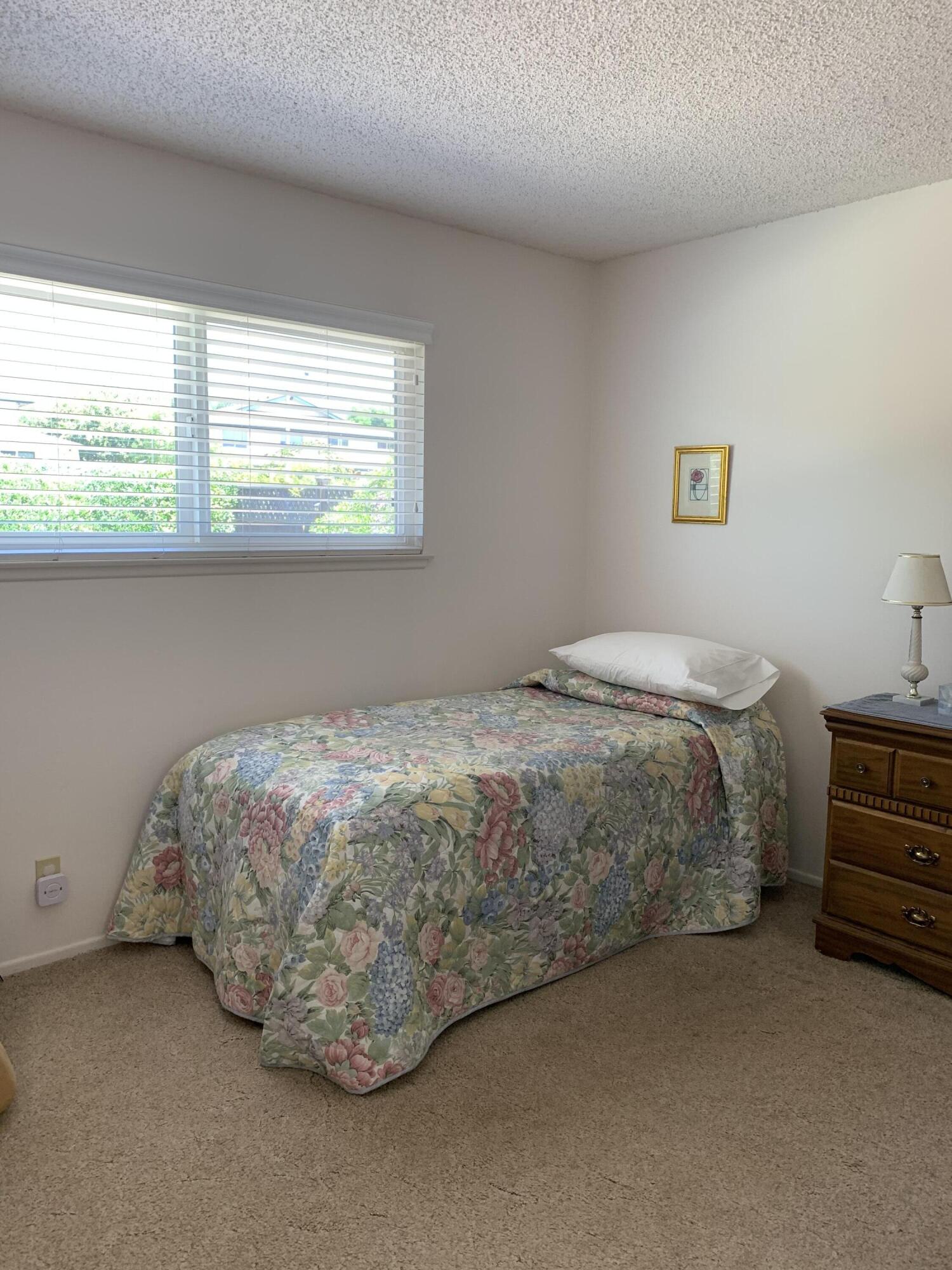 277 Forest Drive Goleta, CA 93117 - Photo 12 of 18 a bedroom with a bed and a window