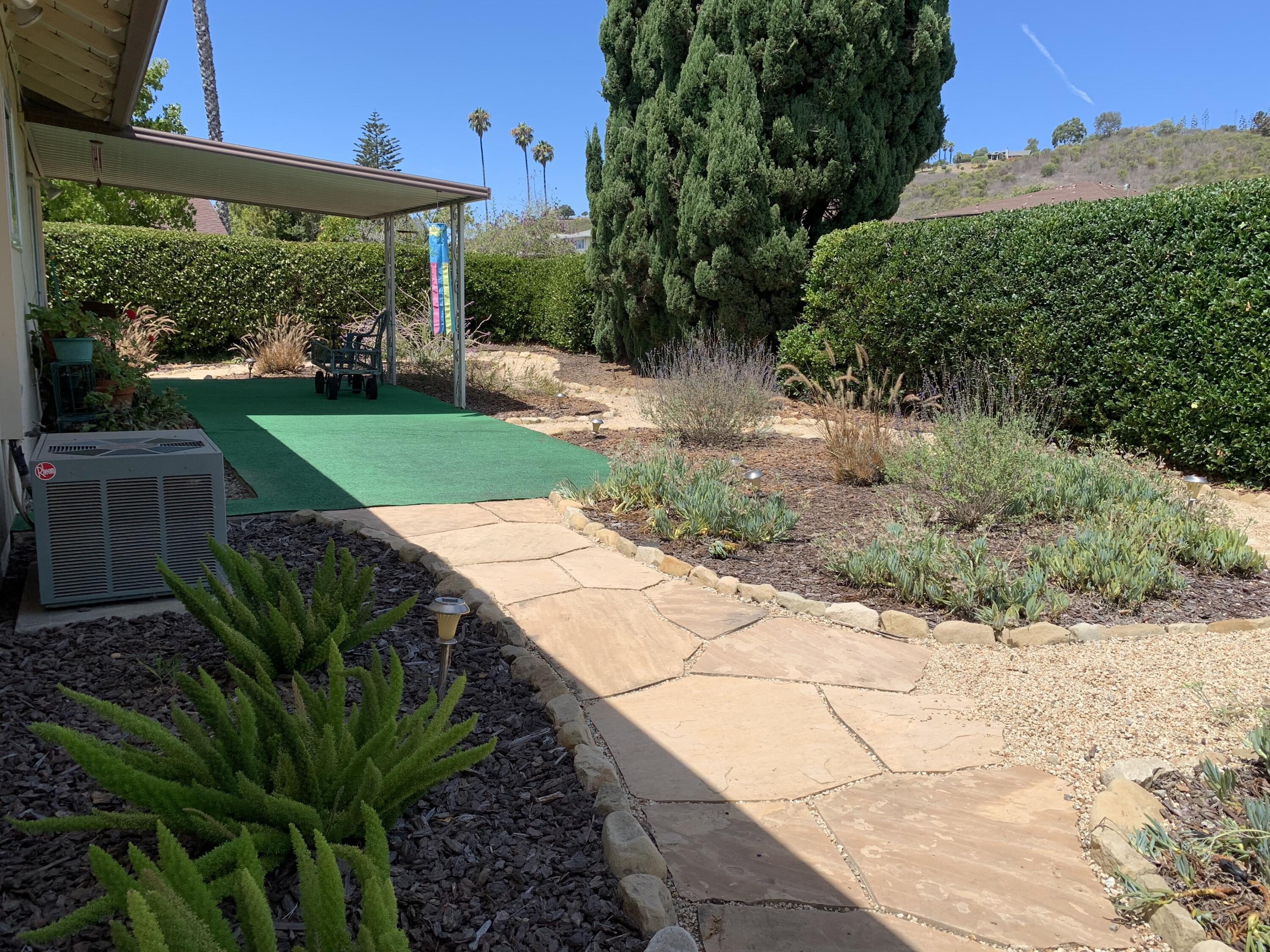 277 Forest Drive Goleta, CA 93117 - Photo 15 of 18 a view of a backyard with plants