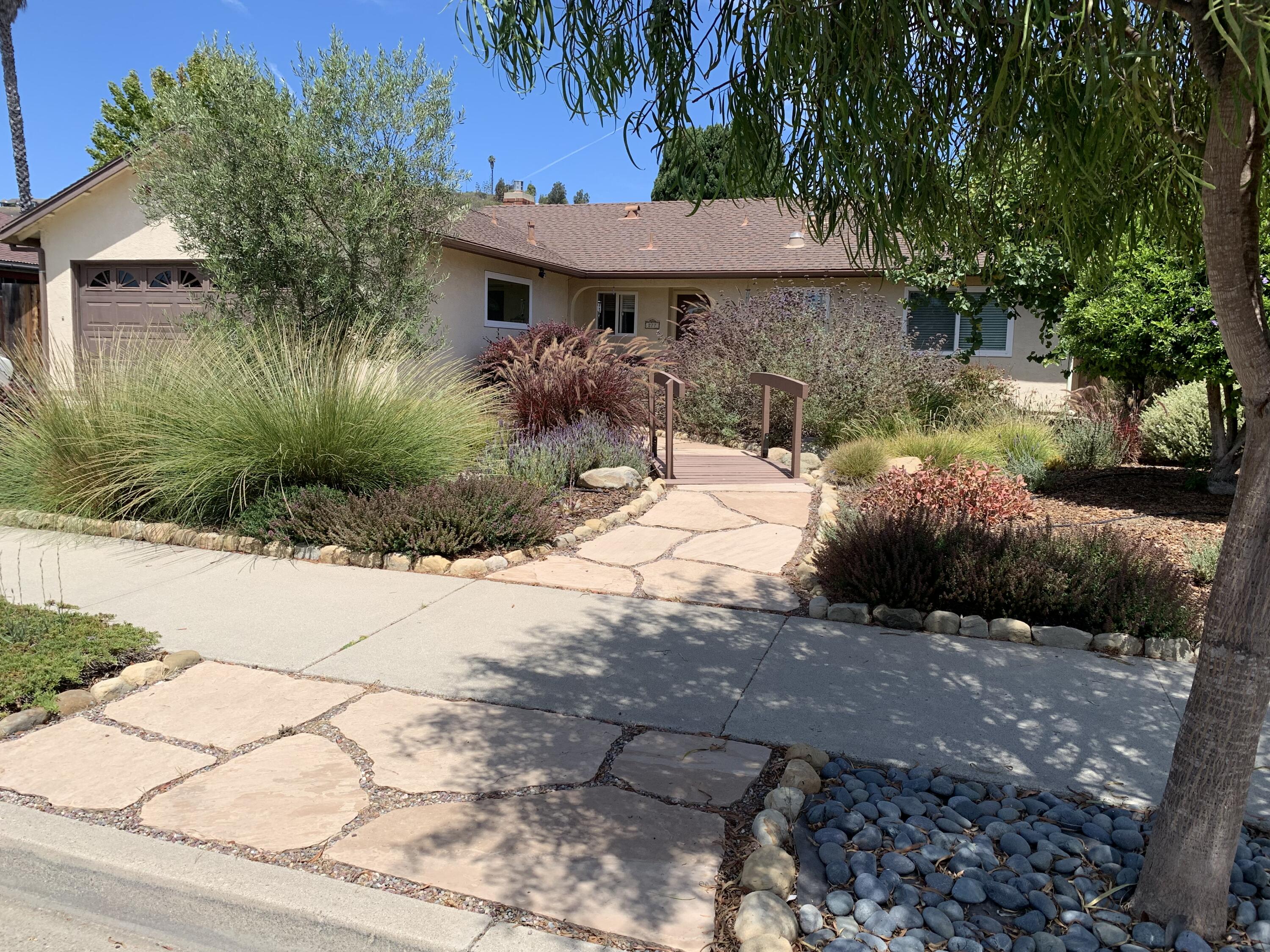 277 Forest Drive Goleta, CA 93117 - Photo 2 of 18 a view of a house with a yard siting area and garden