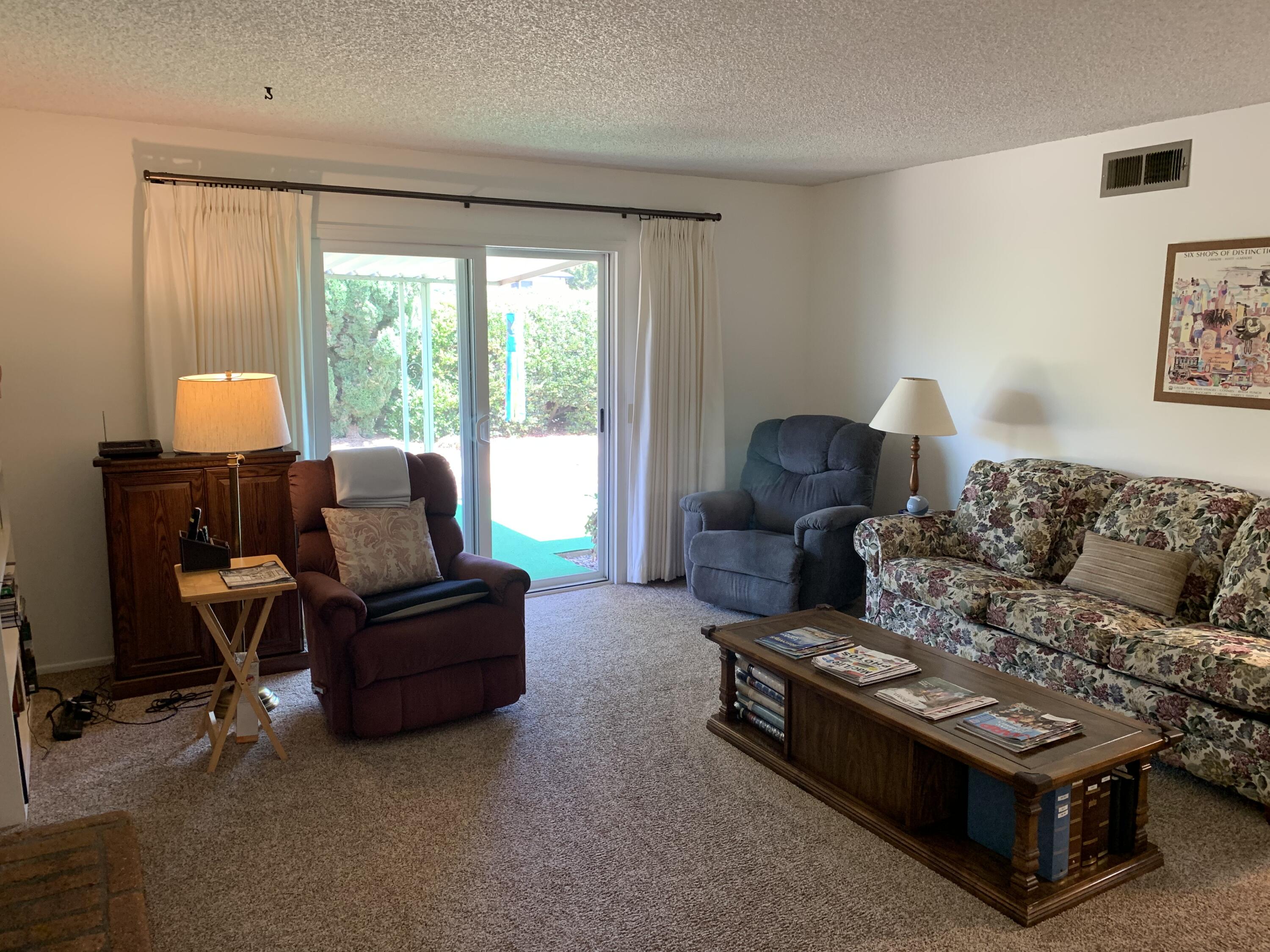 277 Forest Drive Goleta, CA 93117 - Photo 7 of 18 a living room with furniture and a window
