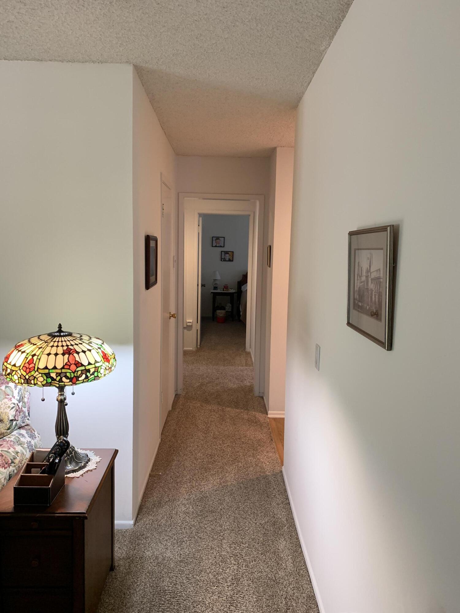 277 Forest Drive Goleta, CA 93117 - Photo 8 of 18 a view of a hallway to a livingroom with a couch