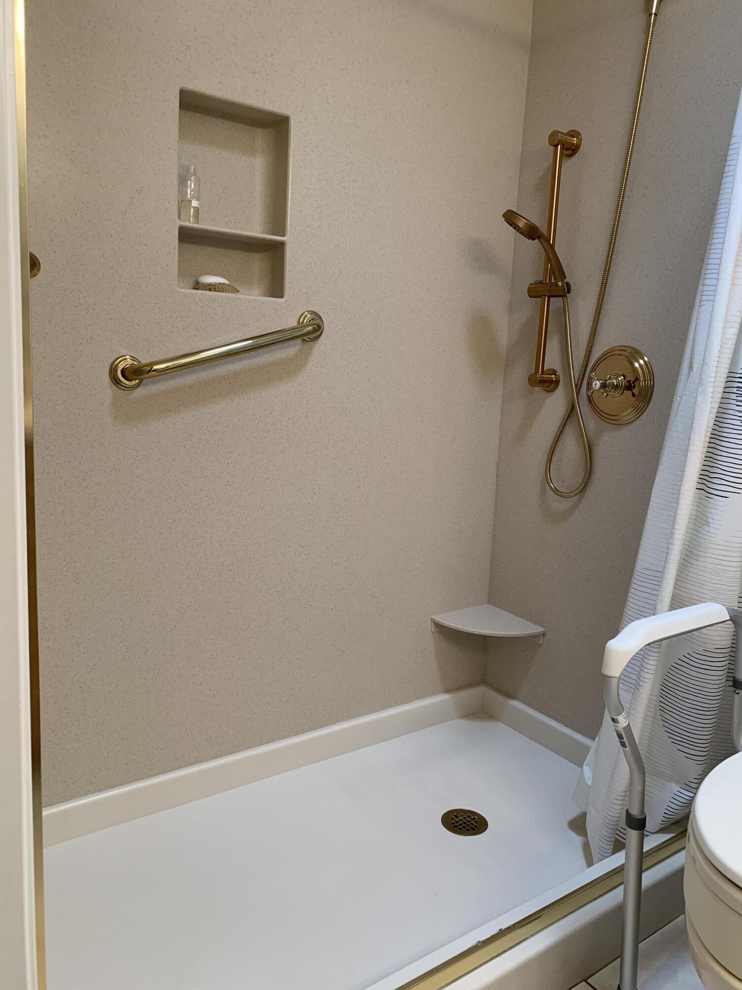 277 Forest Drive Goleta, CA 93117 - Photo 10 of 18 a bathroom with a granite countertop a sink a toilet and mirror