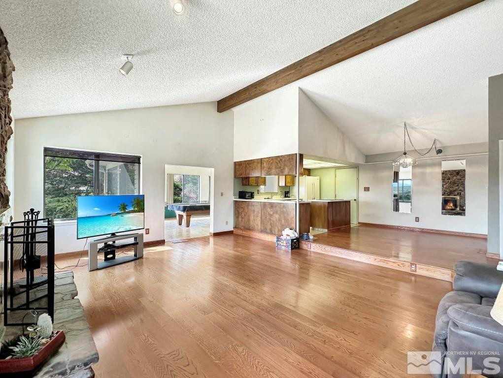 20595 Cooke Drive Reno, NV 89521 - Photo 5 of 32 a living room with furniture and kitchen view
