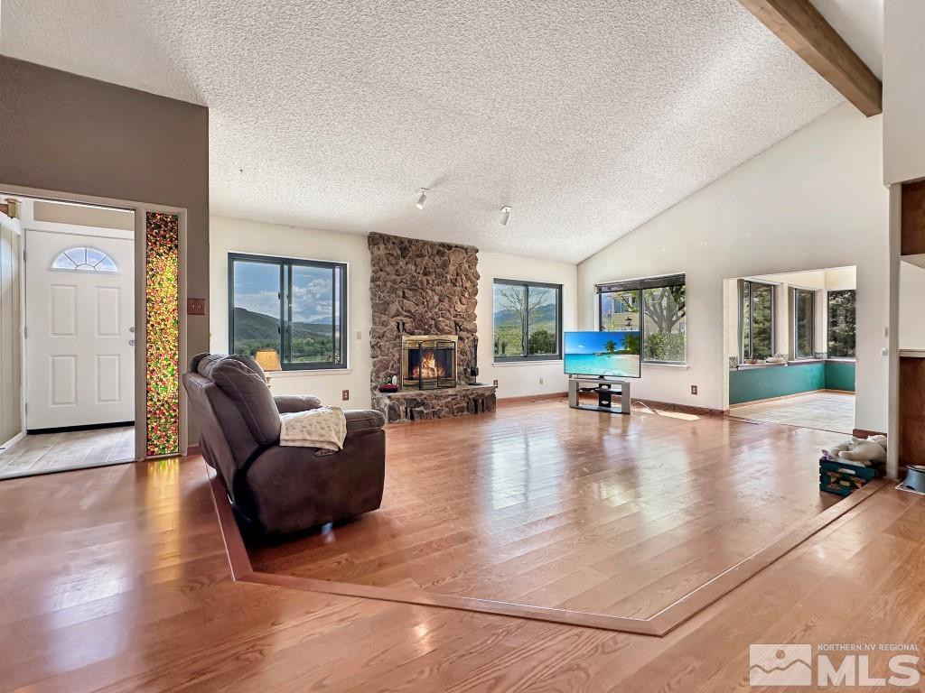 20595 Cooke Drive Reno, NV 89521 - Photo 6 of 32 a living room with furniture and a large window