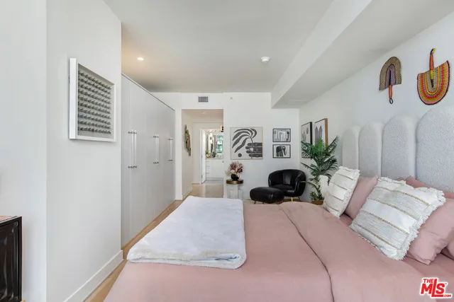 a kitchen with sink and potted plant