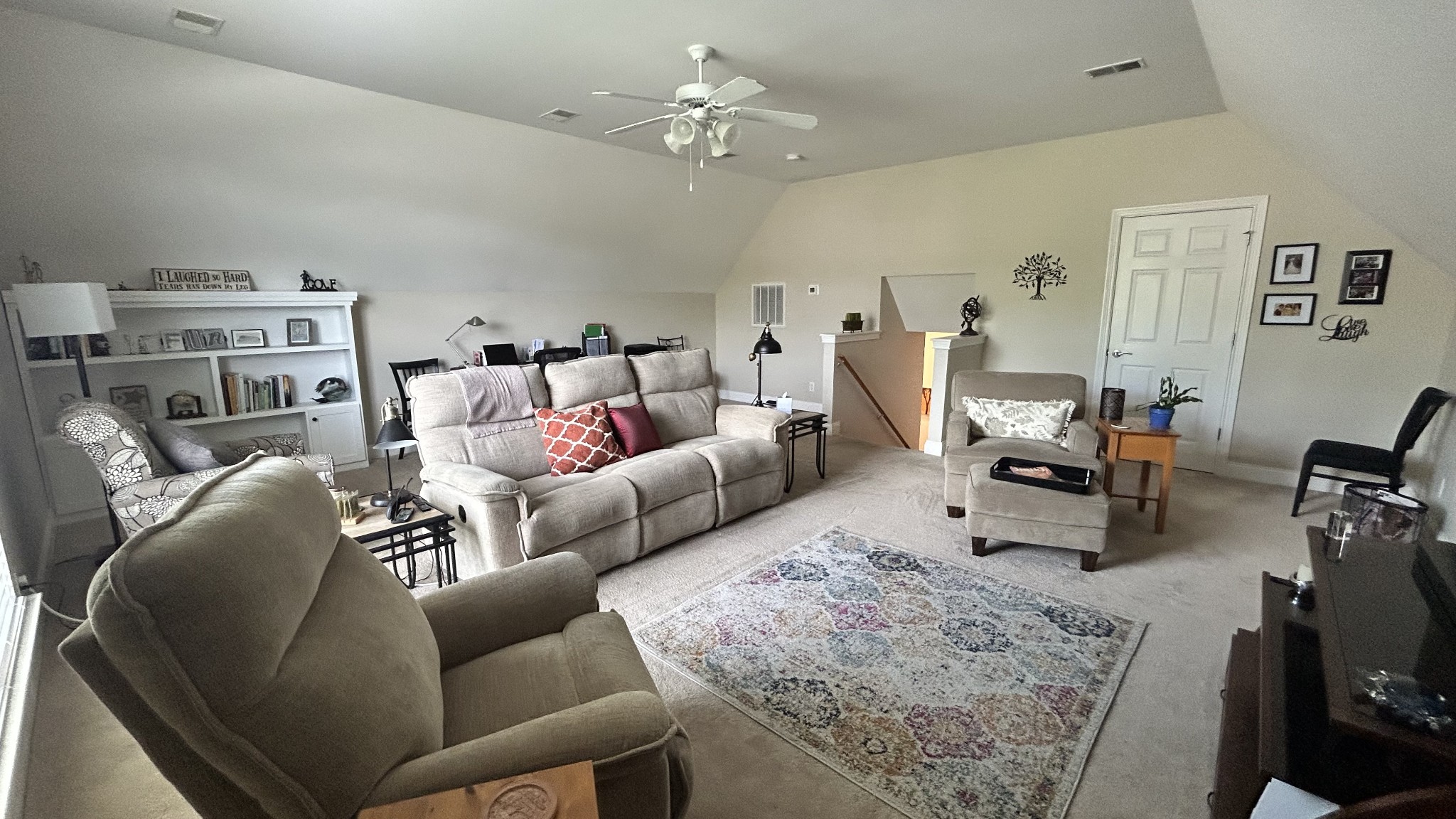 717 Heritage Road Lebanon, TN 37087 - Photo 29 of 30 a living room with furniture and a chandelier