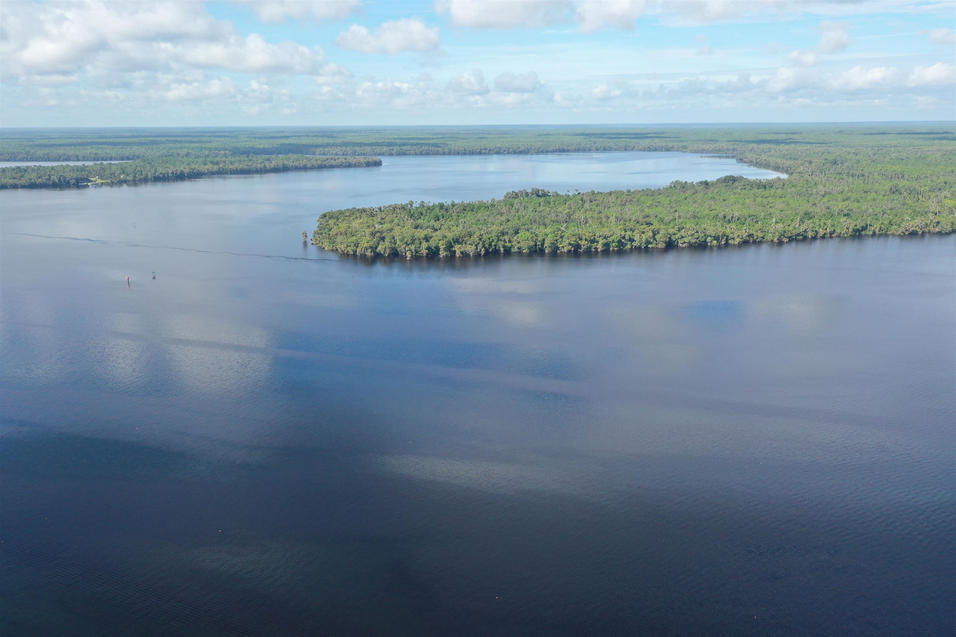 Wooten Rd Crescent Crescent City, FL 32112 - Photo 20 of 25 a view of a lake and mountain in the back