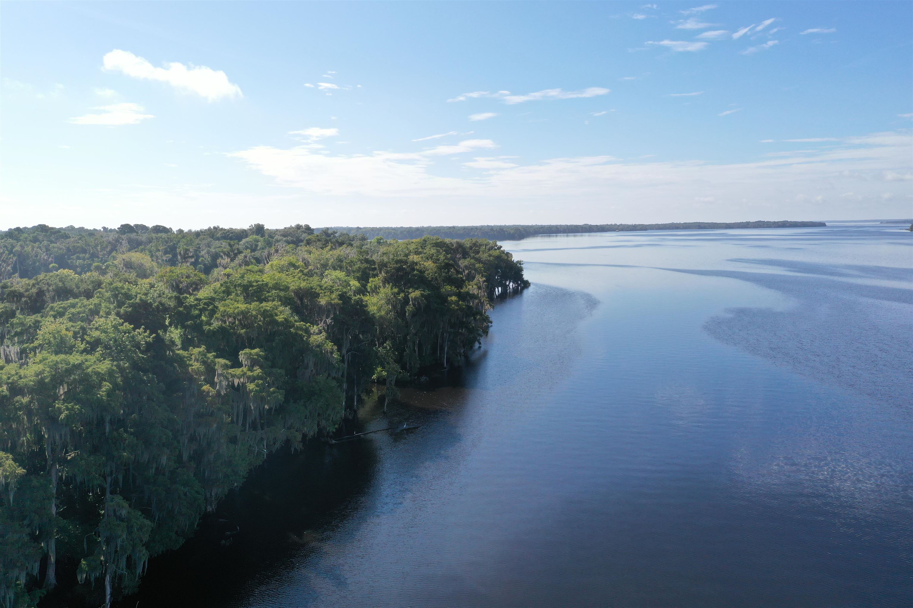 Wooten Rd Crescent Crescent City, FL 32112 - Photo 2 of 25 a view of a lake with mountain