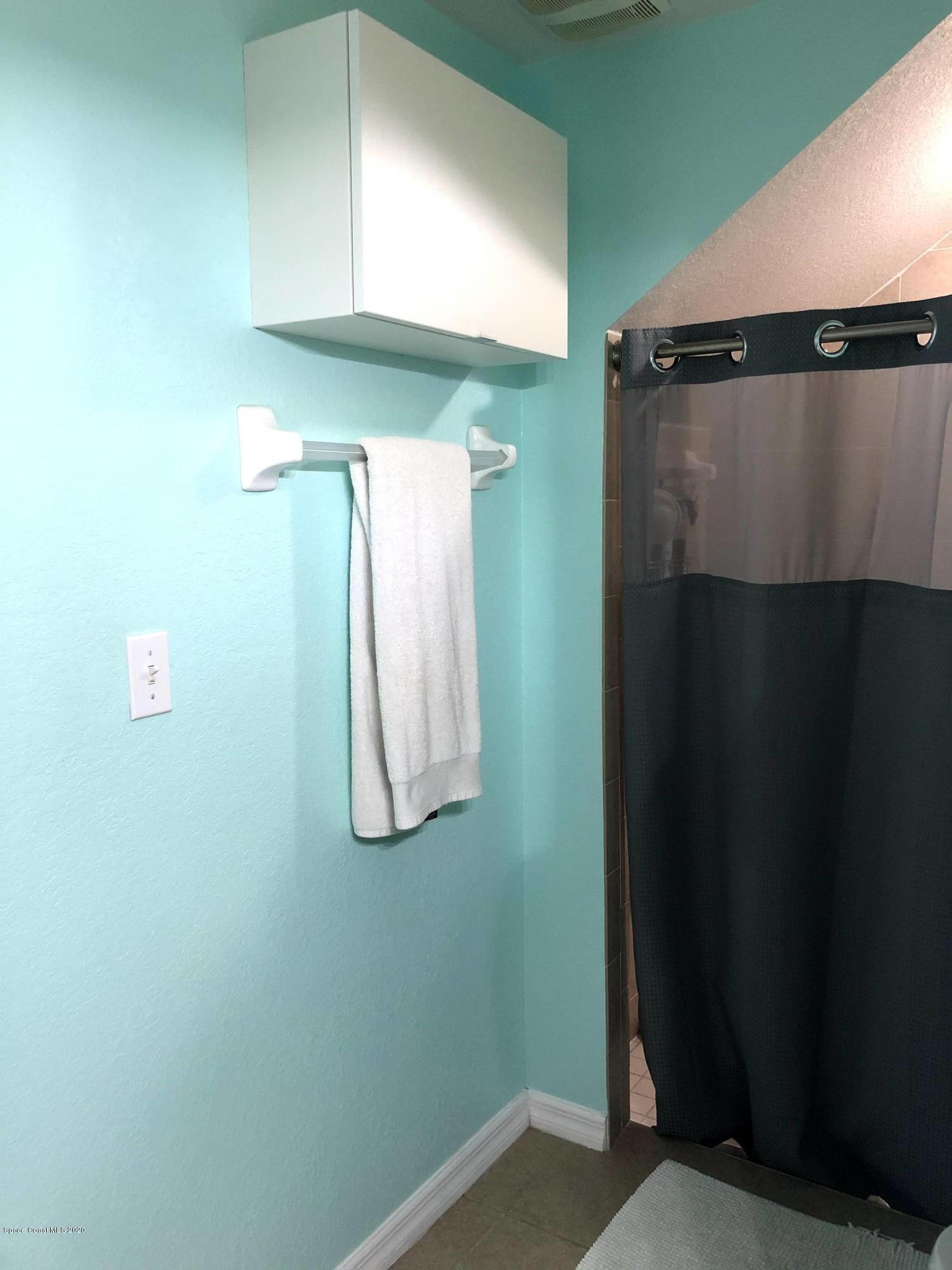 100 Turpial Way, Unit 107 Melbourne, FL 32901 - Photo 43 of 49 a close view of cabinet