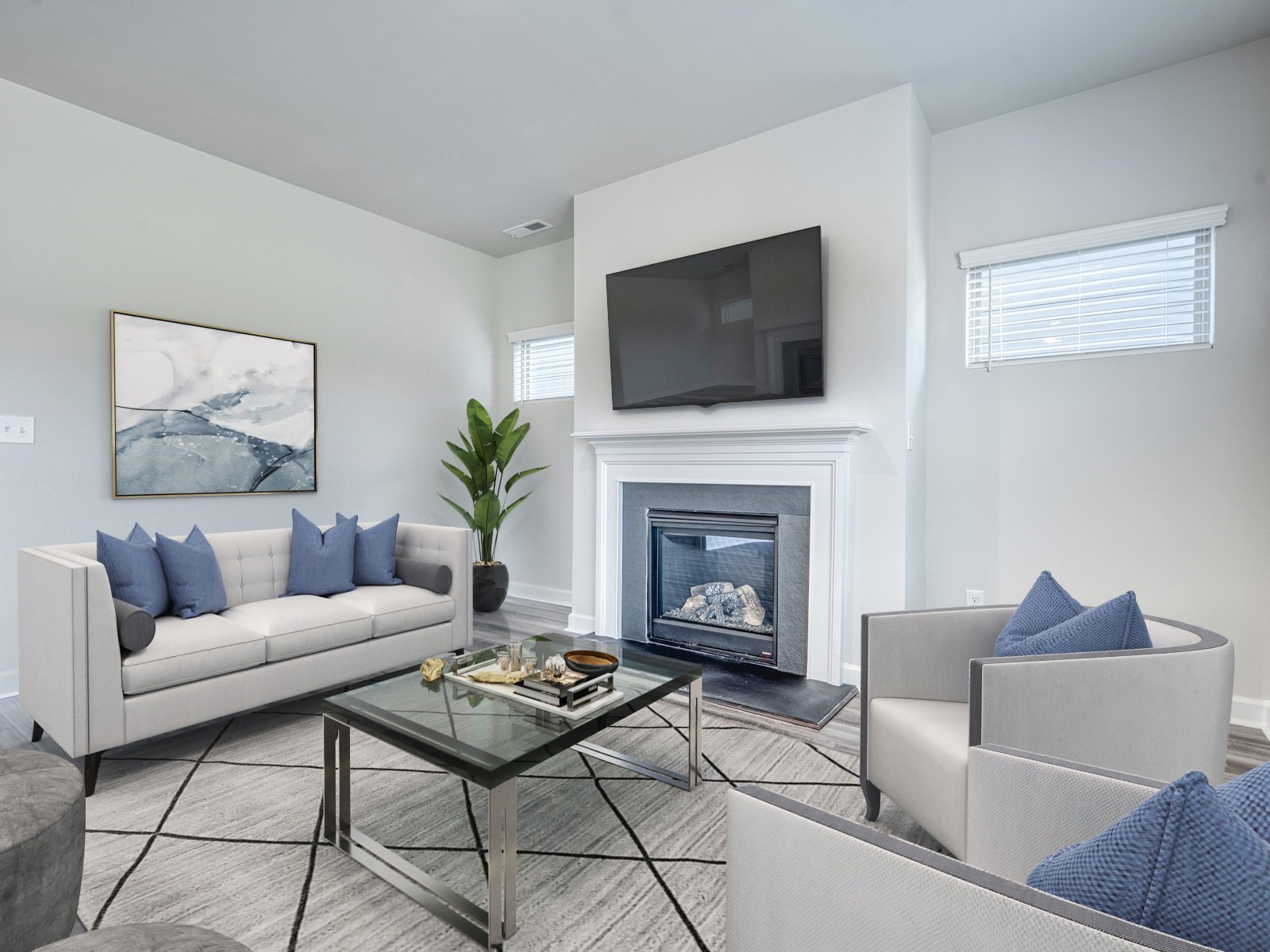 719 Castle Road Mount Juliet, TN 37122 - Photo 7 of 11 a living room with furniture a flat screen tv and a fireplace
