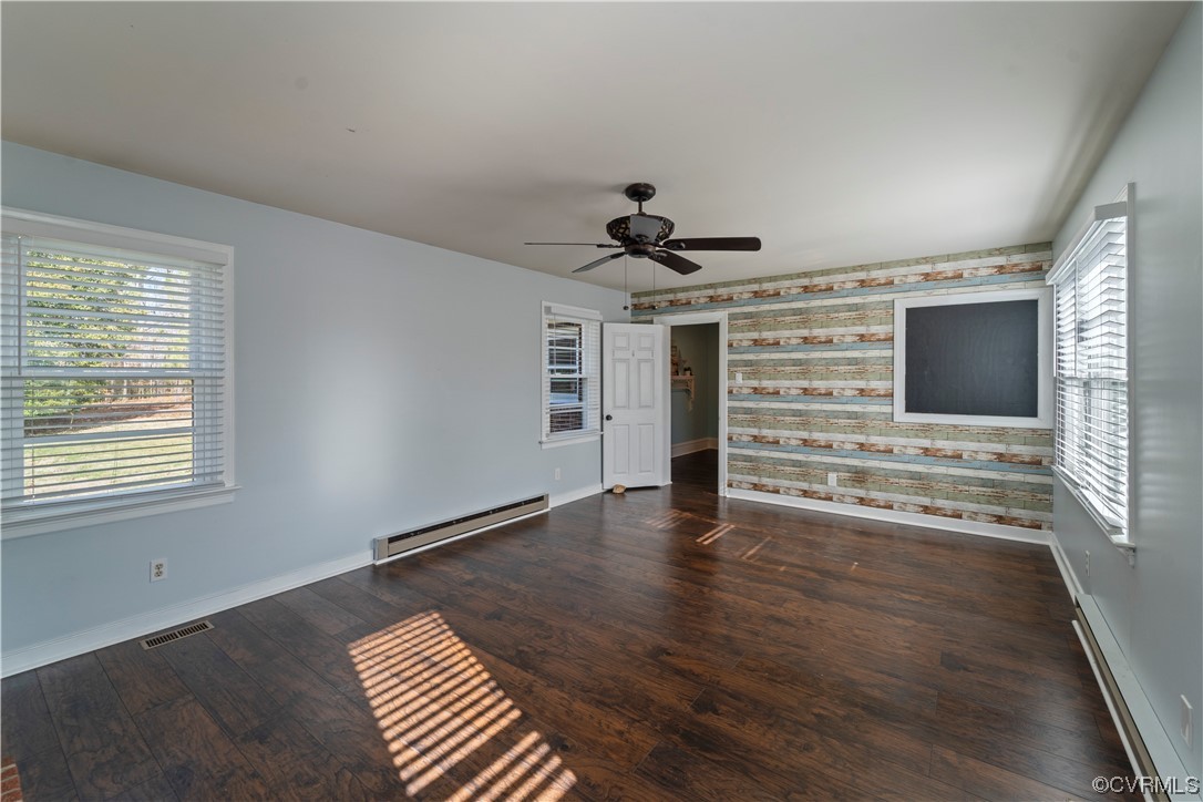 3600 Gregory Pond Road Chesterfield, VA 23236 - Photo 11 of 36 a view of an empty room with a window and wooden floor
