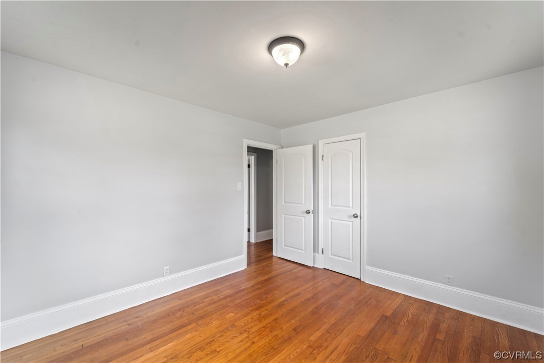 3600 Gregory Pond Road Chesterfield, VA 23236 - Photo 18 of 36 a view of an empty room with wooden floor
