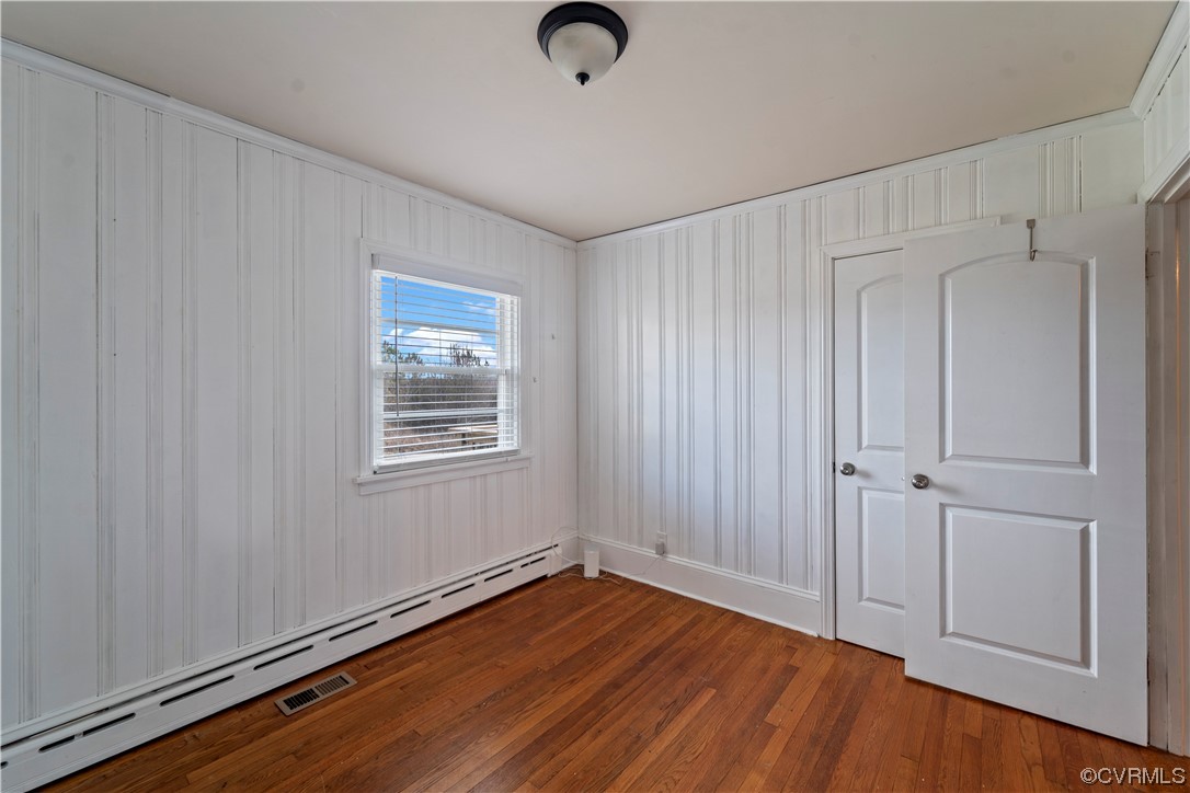 3600 Gregory Pond Road Chesterfield, VA 23236 - Photo 20 of 36 a view of an empty room with wooden floor
