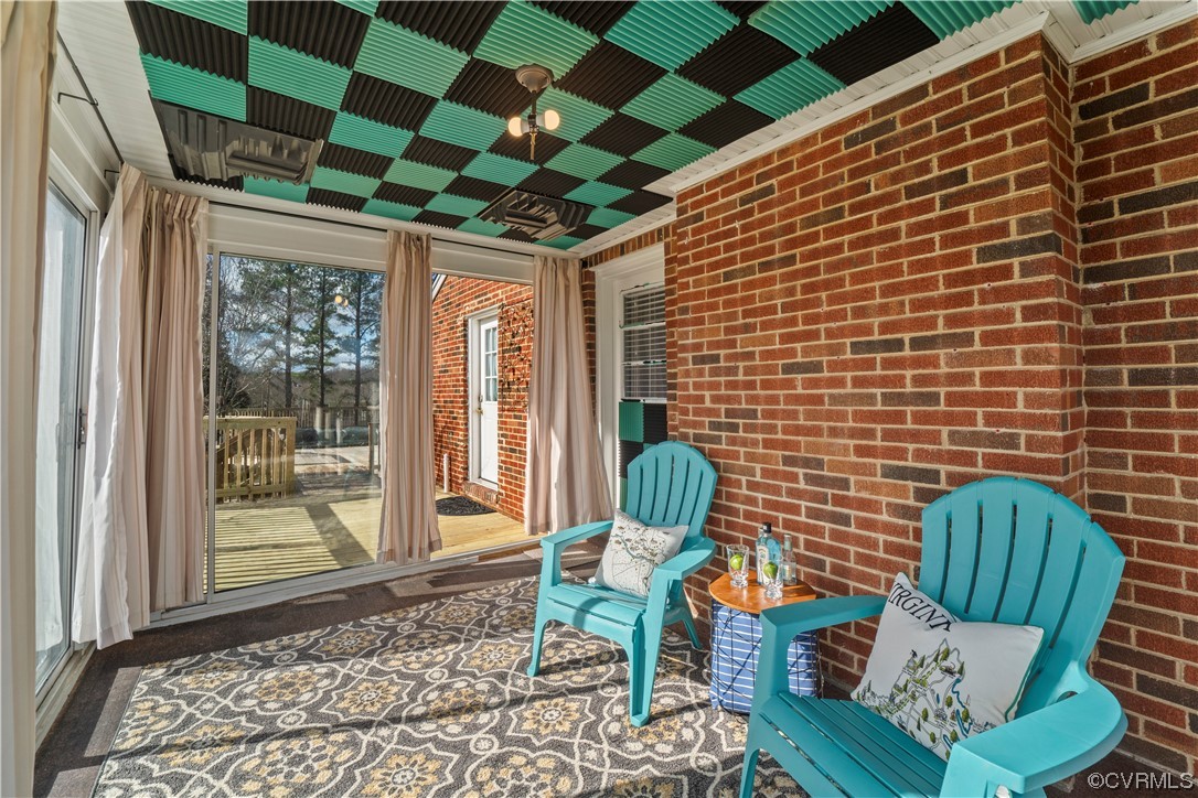 3600 Gregory Pond Road Chesterfield, VA 23236 - Photo 24 of 36 a outdoor living space with furniture and a rug
