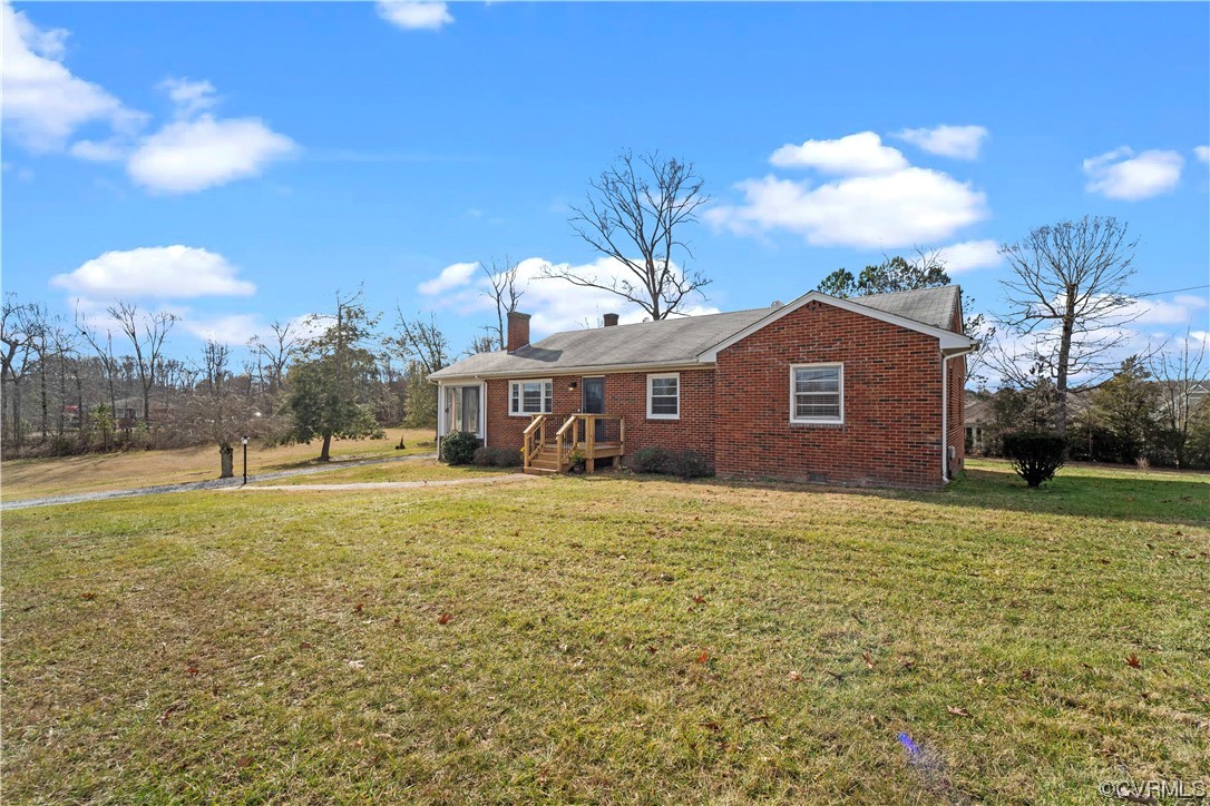 3600 Gregory Pond Road Chesterfield, VA 23236 - Photo 31 of 36 a front view of a house with a yard