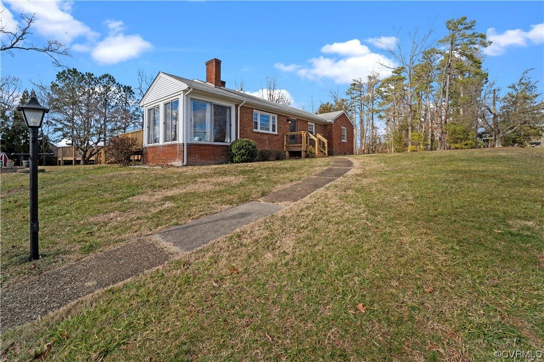 3600 Gregory Pond Road Chesterfield, VA 23236 - Photo 32 of 36 a front view of a house with a yard
