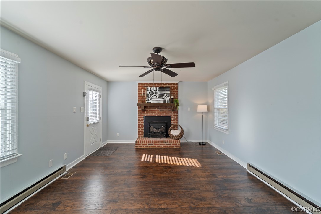 3600 Gregory Pond Road Chesterfield, VA 23236 - Photo 10 of 36 a living room with furniture and a fireplace