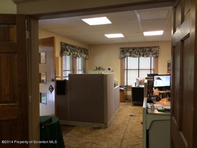 406 North State Street Clarks Summit, PA 18411 - Photo 5 of 6 a view of a kitchen with fridge and windows