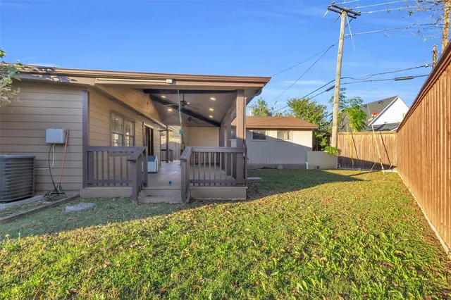 a view of backyard with green space