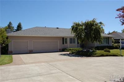 746 McClay Road Novato, CA 94947 - Photo 1 of 12 a front view of a house with a yard and garage