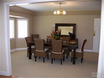 746 McClay Road Novato, CA 94947 - Photo 6 of 12 a view of a dining room with furniture and chandelier