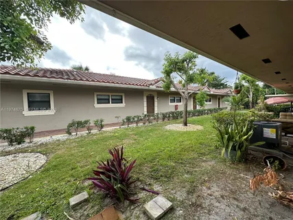 a front view of house with yard