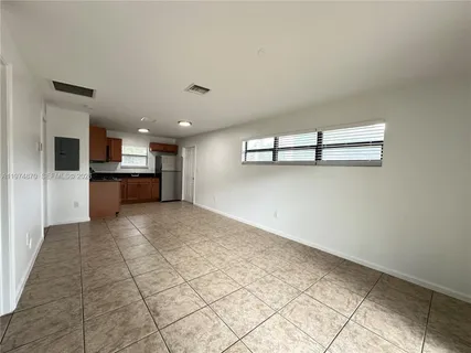a view of a kitchen with a sink