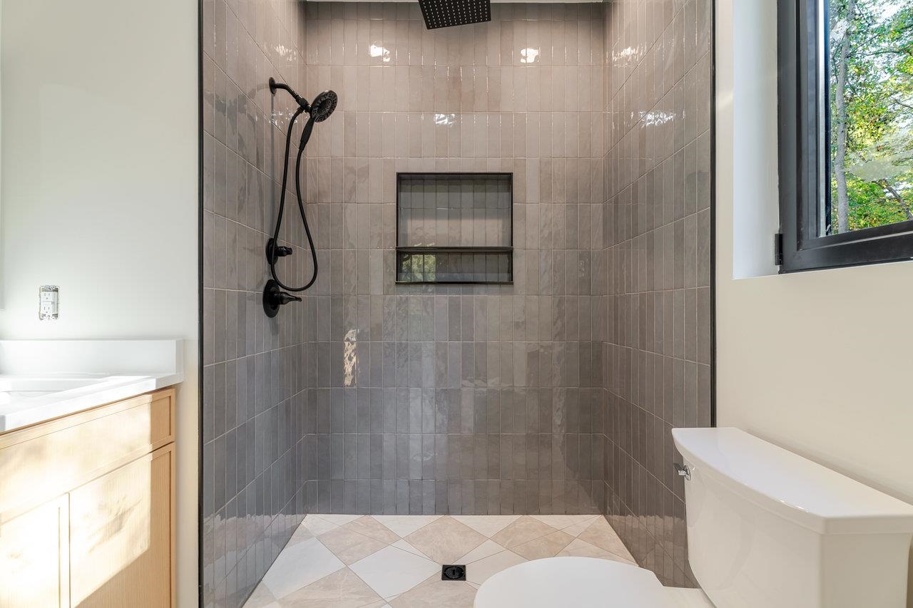 209 Beaver Road Basye, VA 22842 - Photo 28 of 68 a bathroom with a shower and a toilet