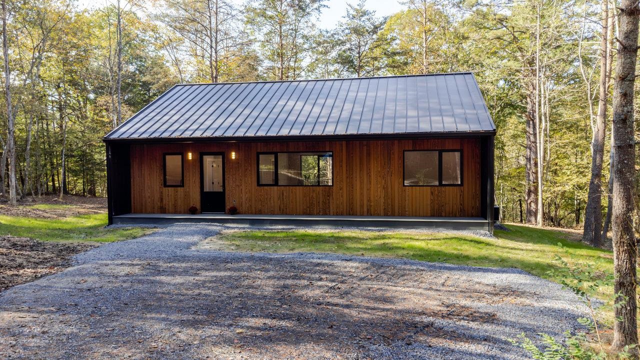209 Beaver Road Basye, VA 22842 - Photo 59 of 68 a front view of a house with a yard