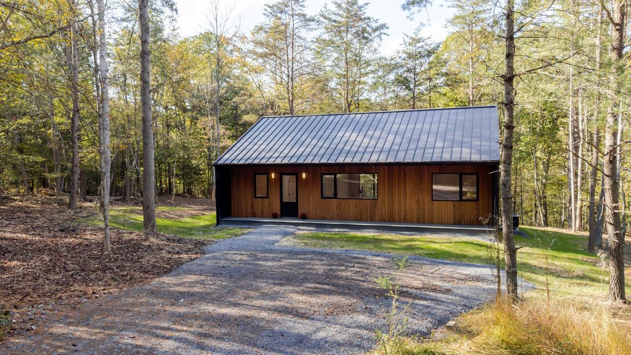 209 Beaver Road Basye, VA 22842 - Photo 60 of 68 a front view of a house with a yard