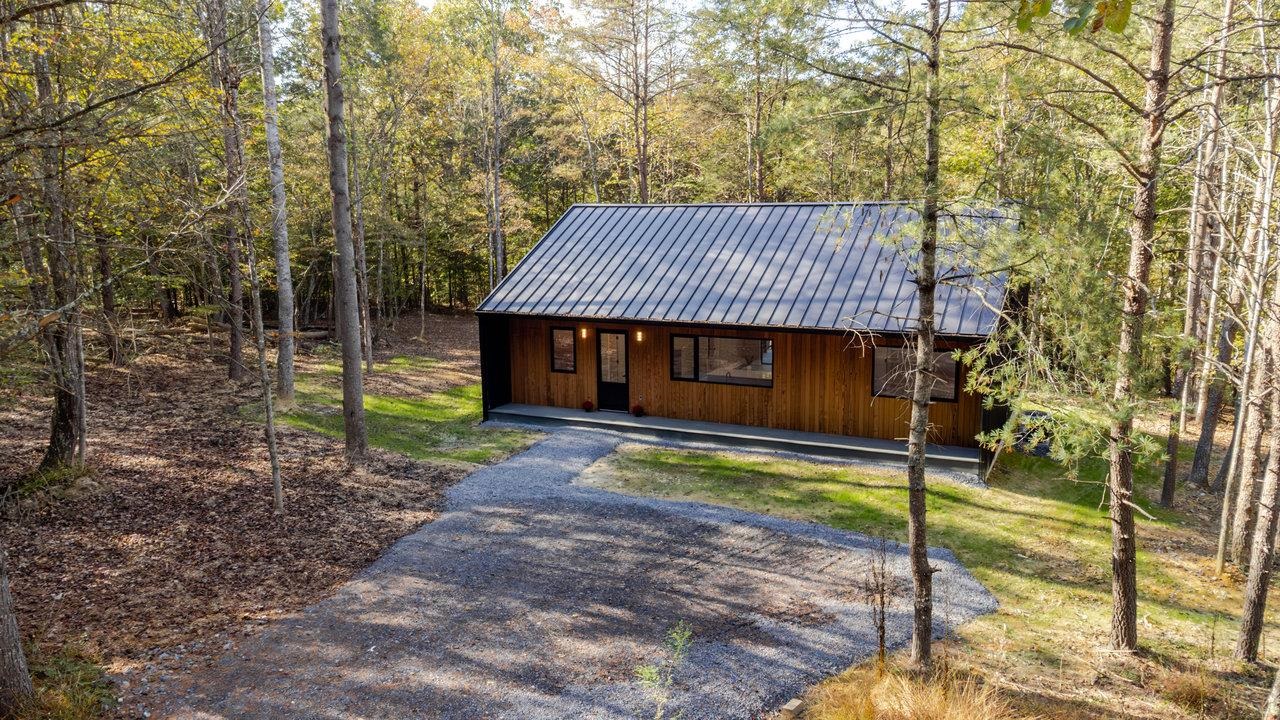 209 Beaver Road Basye, VA 22842 - Photo 63 of 68 a view of a house with backyard and sitting area