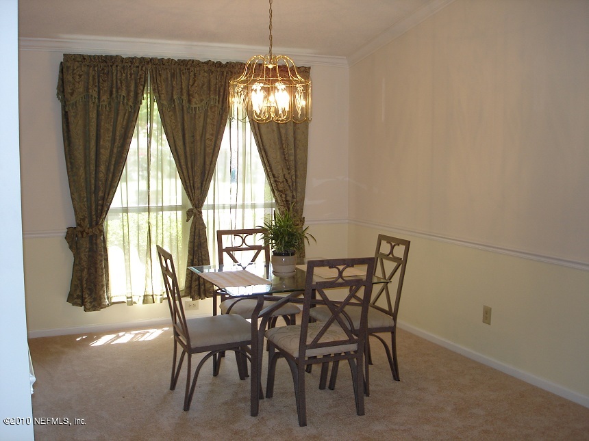 9140 Runnymeade Road Jacksonville, FL 32257 - Photo 3 of 25 Dining room with new paint & carpet