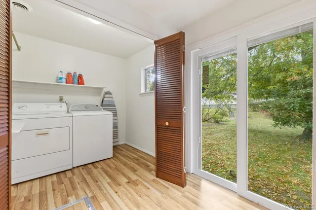 a view of a hallway with windows