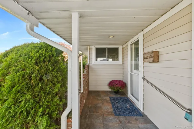 a view of house with backyard space