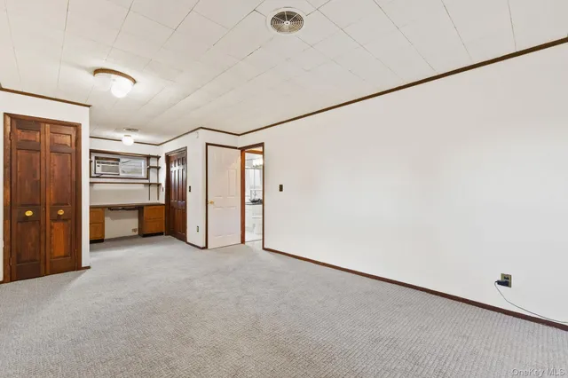 a bathroom with a sink a mirror and a shower
