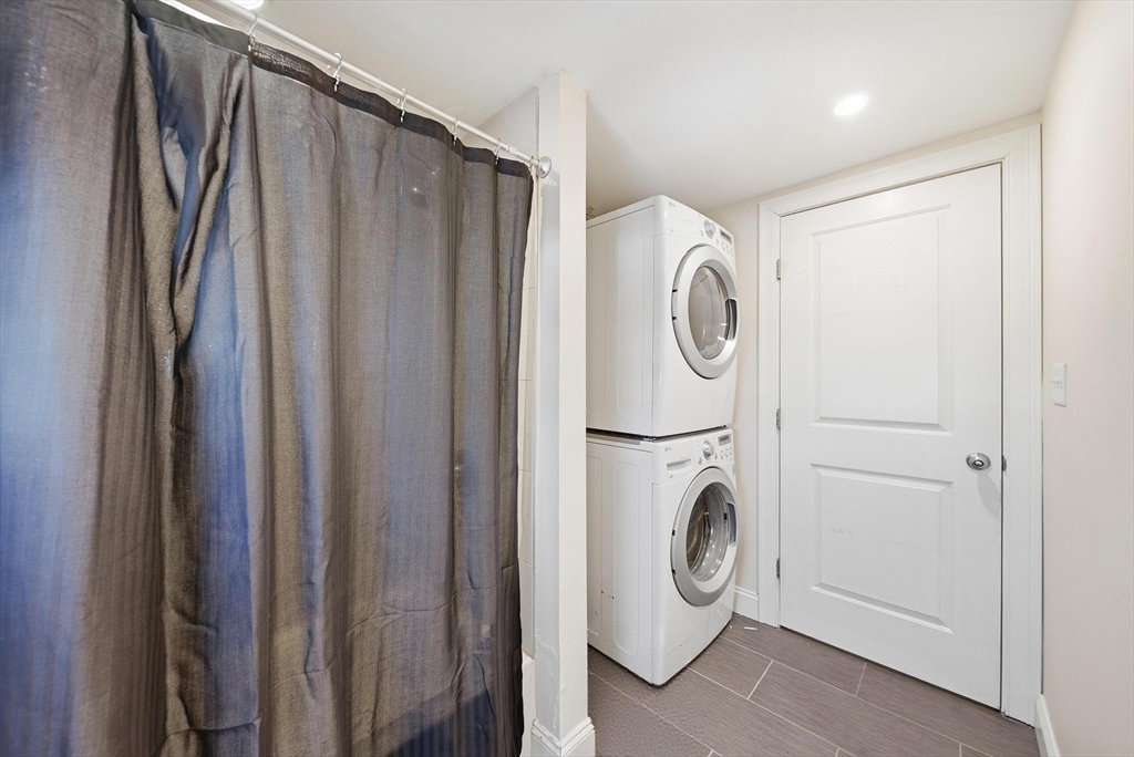 48-50 Carleton Street Newton, MA 02458 - Photo 18 of 19 a utility room with dryer and washer
