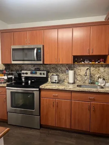 $358,000 | 7430 Miami Lakes Drive, Unit E110, Miami Lakes, FL 33014