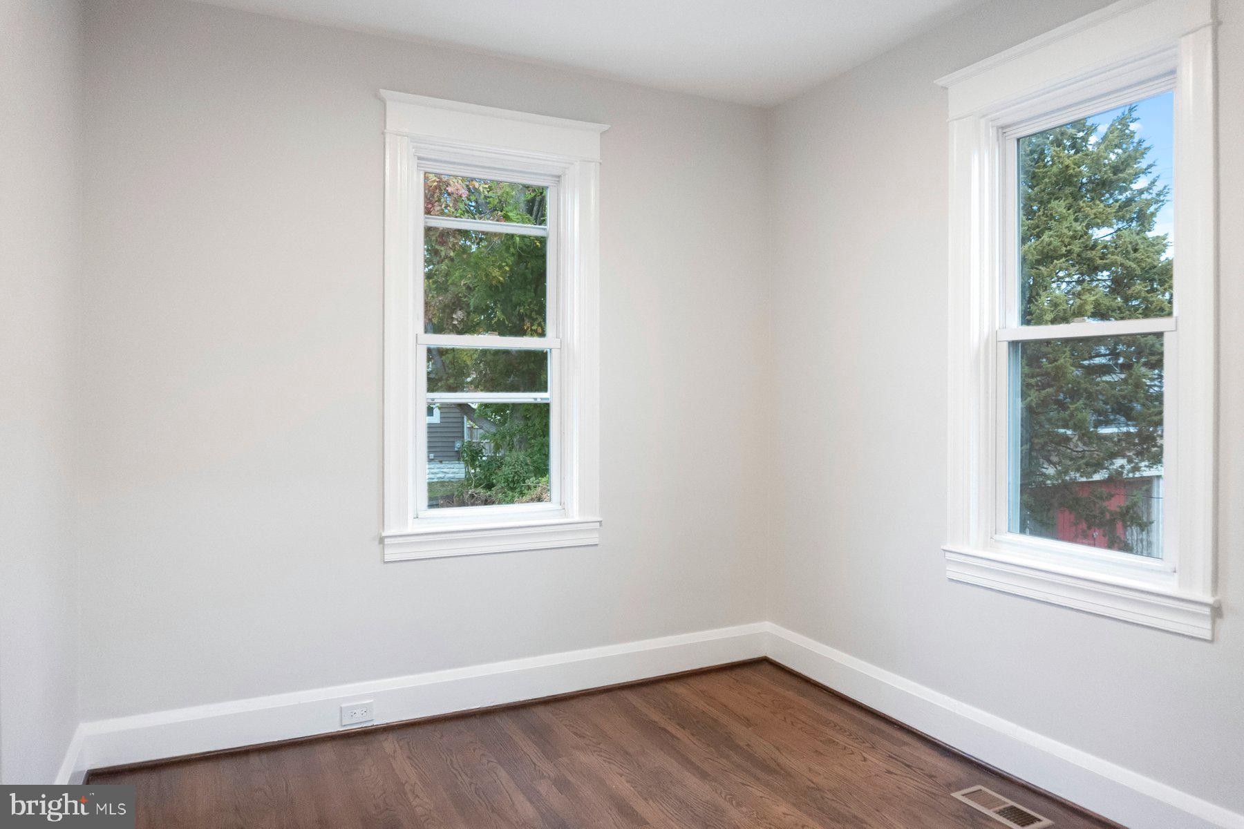 5216 Biddison Lane Baltimore, MD 21206 - Photo 17 of 32 an empty room with a window