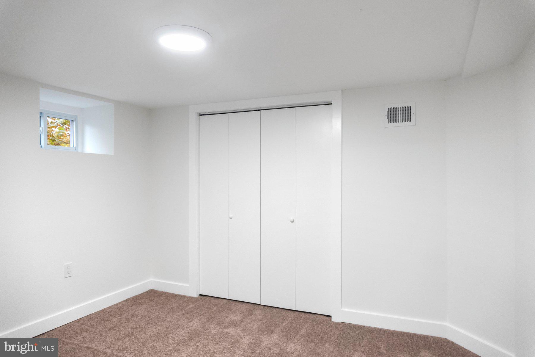 5216 Biddison Lane Baltimore, MD 21206 - Photo 21 of 32 a view of an empty room