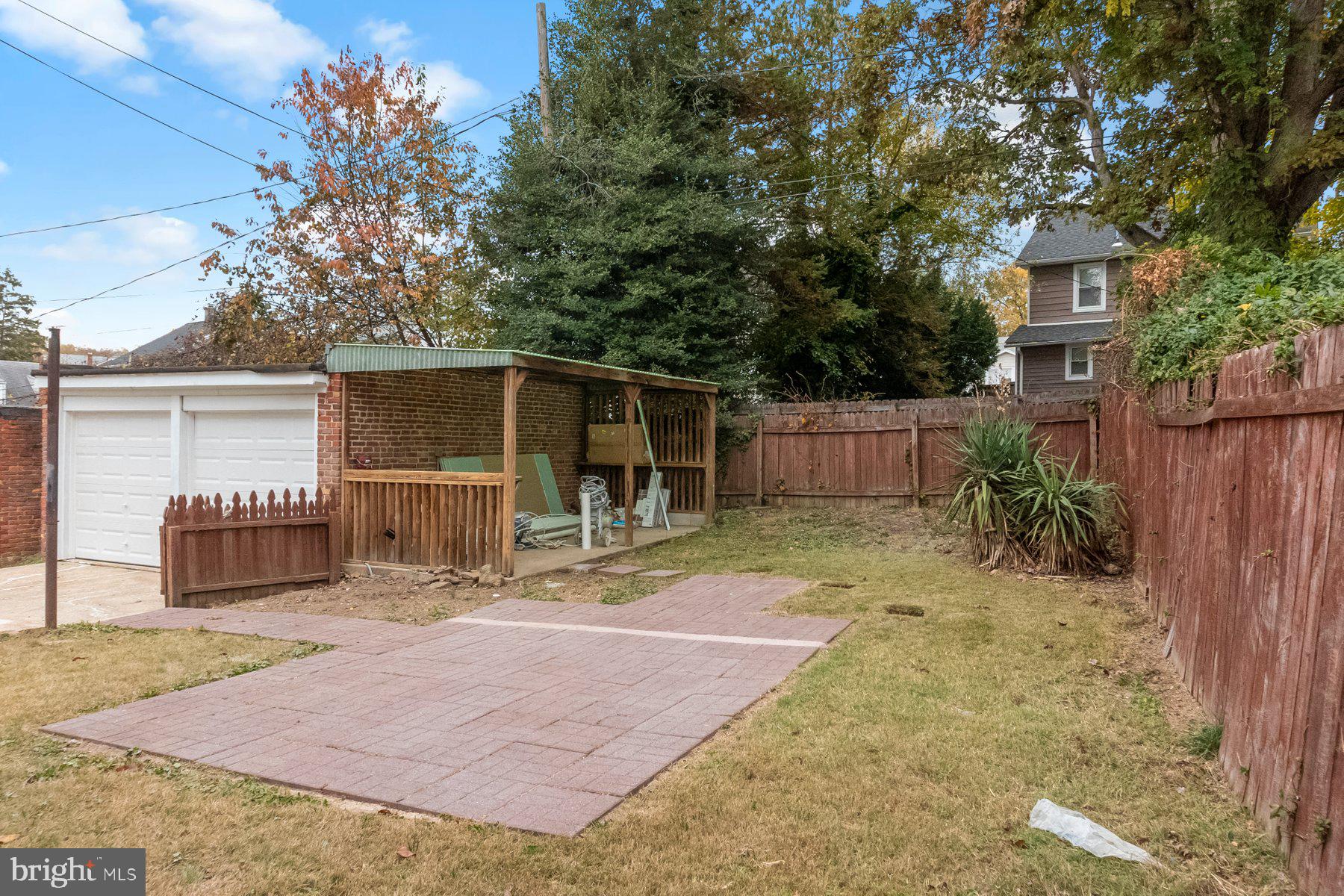 5216 Biddison Lane Baltimore, MD 21206 - Photo 26 of 32 front view of a house with a yard