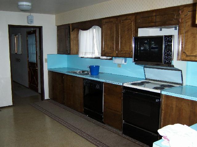 251 Phipps Road Outlook, WA 98938 - Photo 5 of 6 a kitchen with a sink and a cabinets
