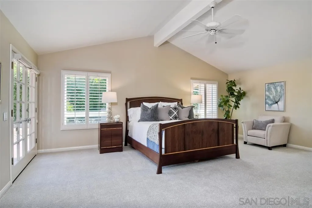15805 Lime Grove Road Poway, CA 92064 - Photo 11 of 25 a bedroom with a bed and a couch