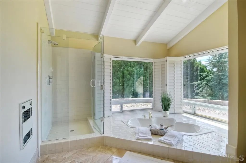 15805 Lime Grove Road Poway, CA 92064 - Photo 12 of 25 a room with a large window and a table