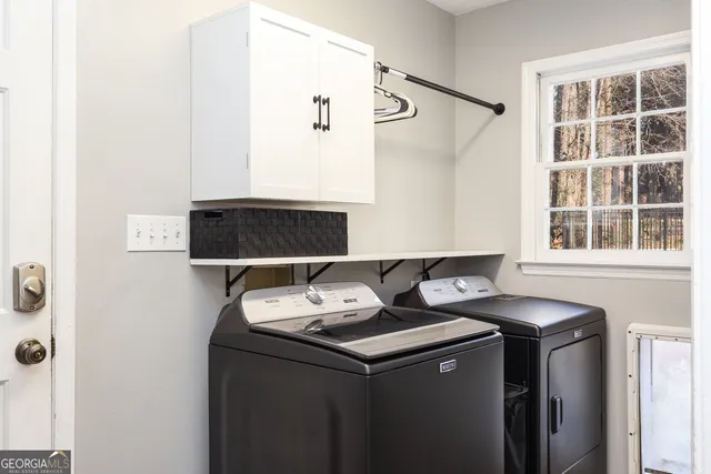 a view of a kitchen from the hallway