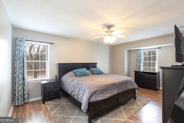 a bathroom with a sink vanity and a mirror