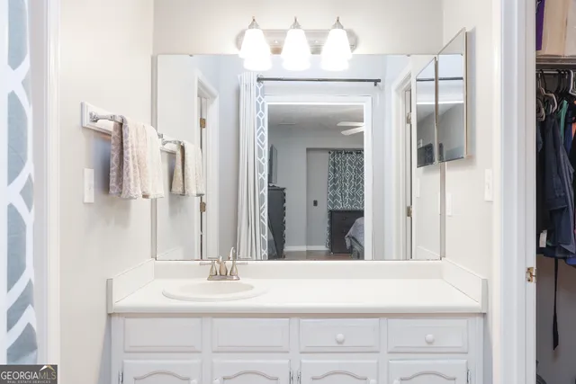 a bathroom with a bathtub and a toilet